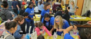 Exploring Acid-Base chemistry using red cabbage juice indicator at Lincoln Elementary STEAM Night on 16 November 2023